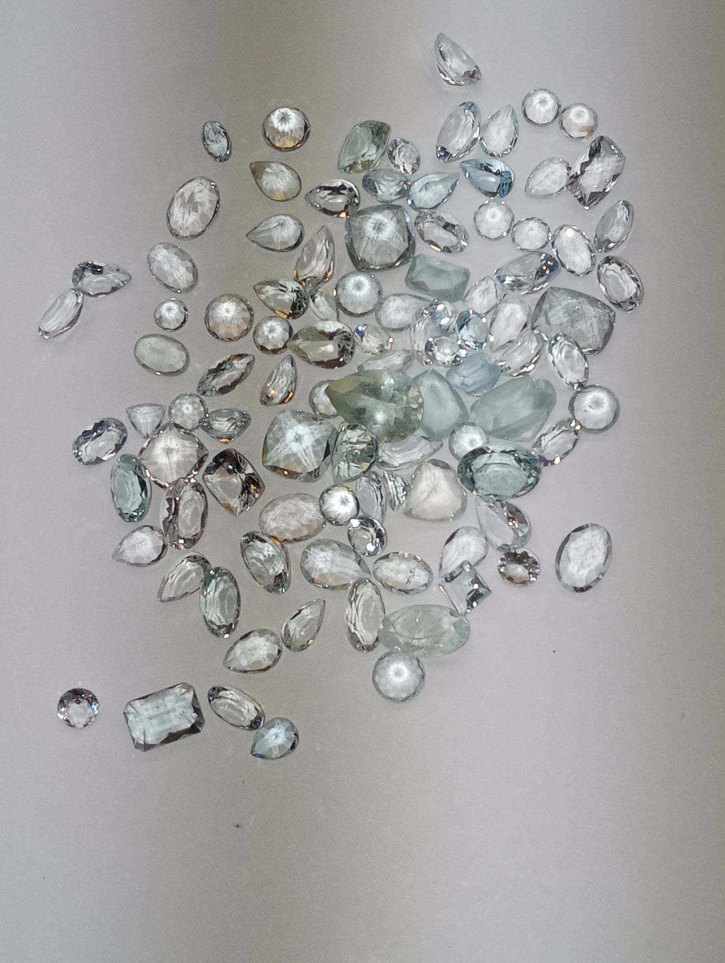 aquamarine gemstones light mixed shapes