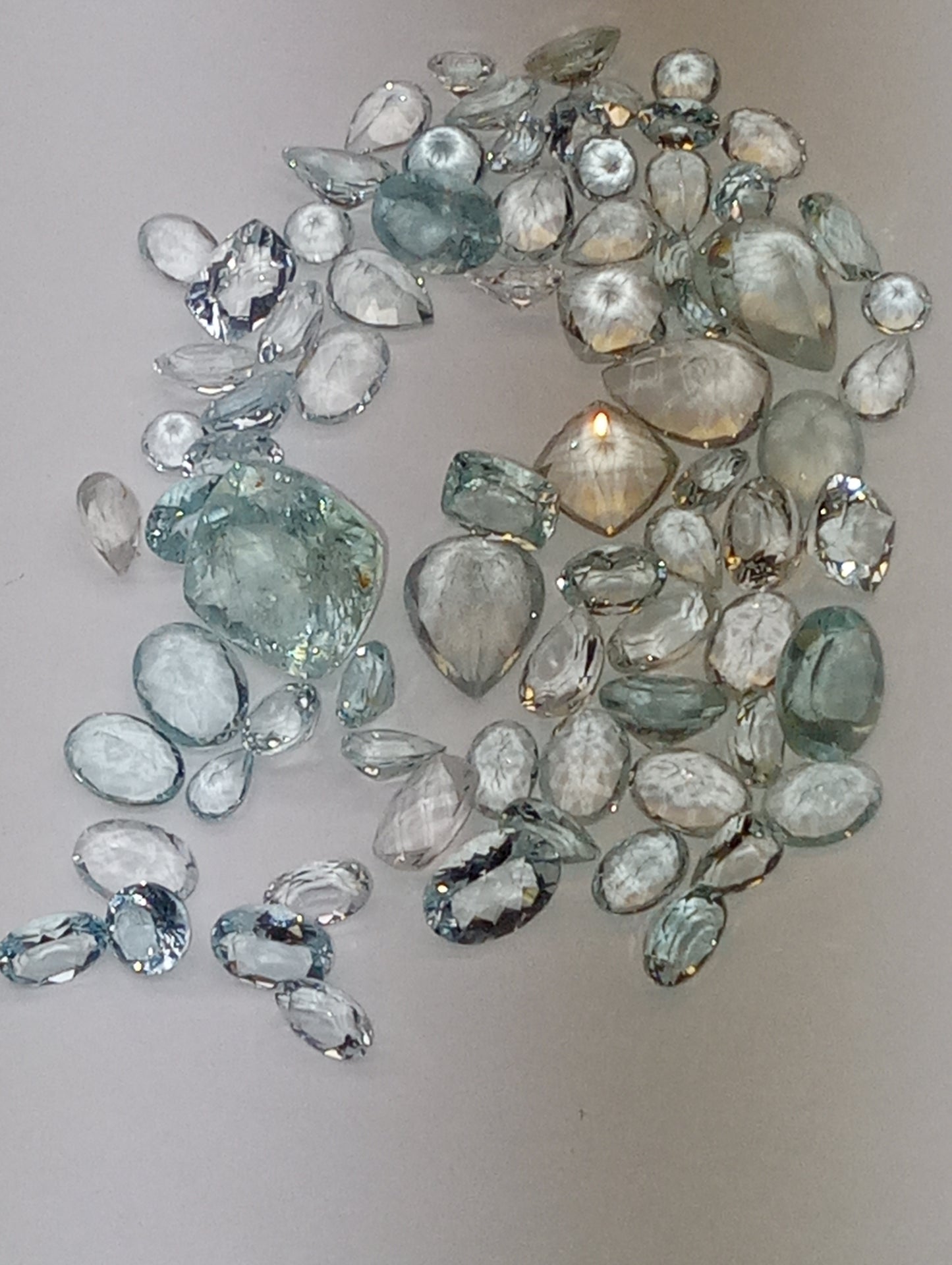 aquamarine gemstones light mixed shapes