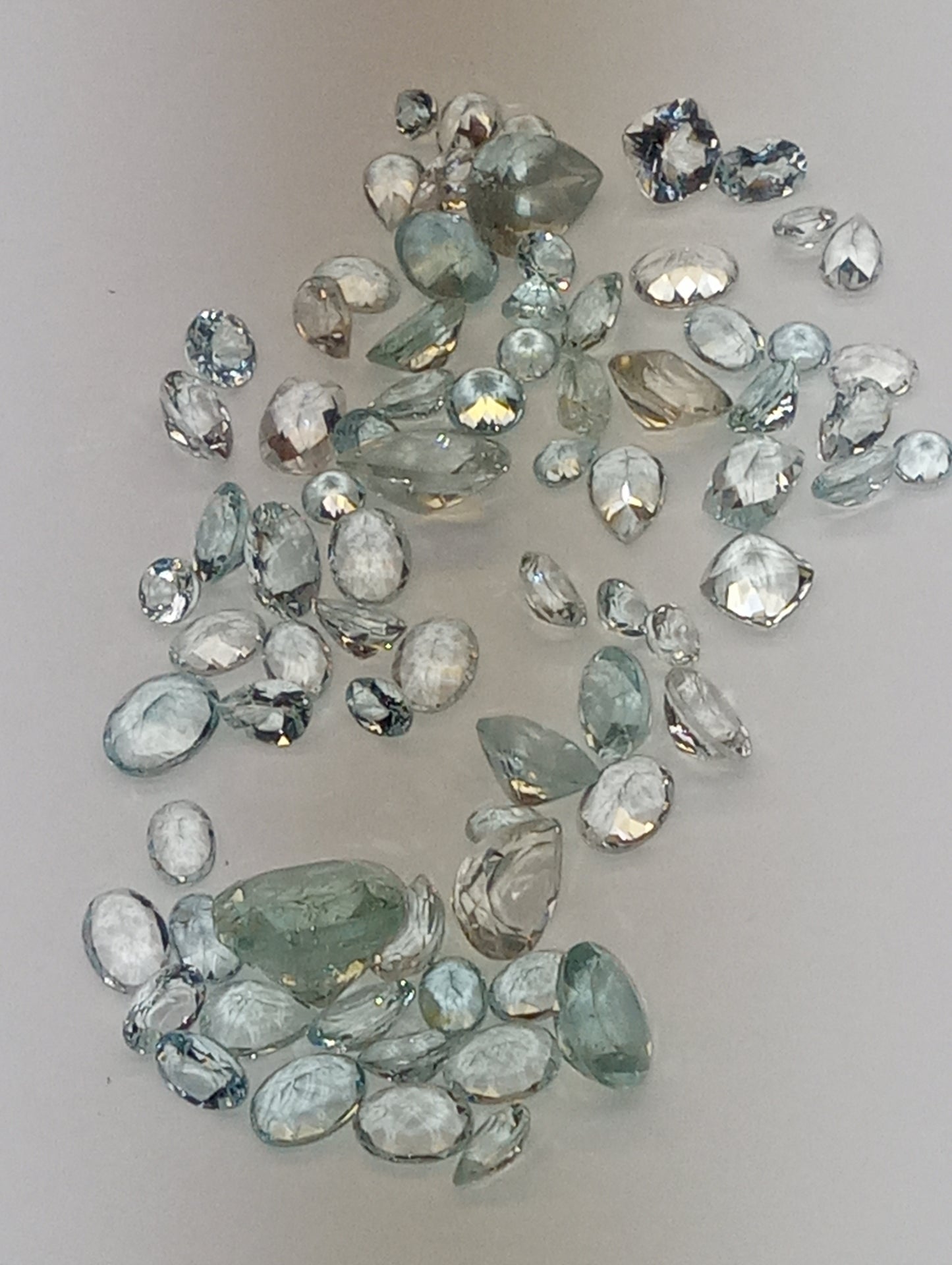aquamarine gemstones light mixed shapes