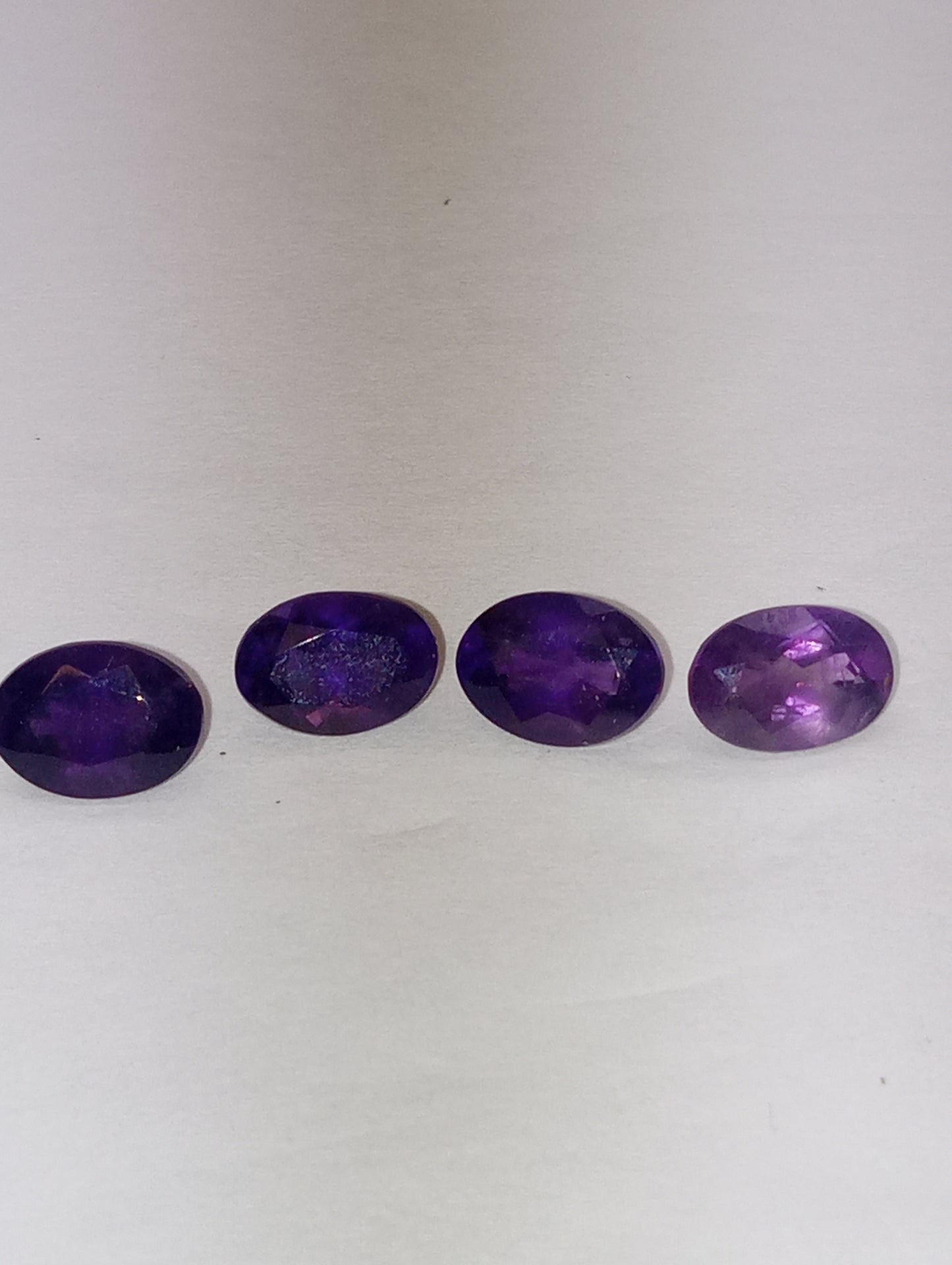 amethyst gemstones ovals 7mmx5mm, 4 stones  dark
