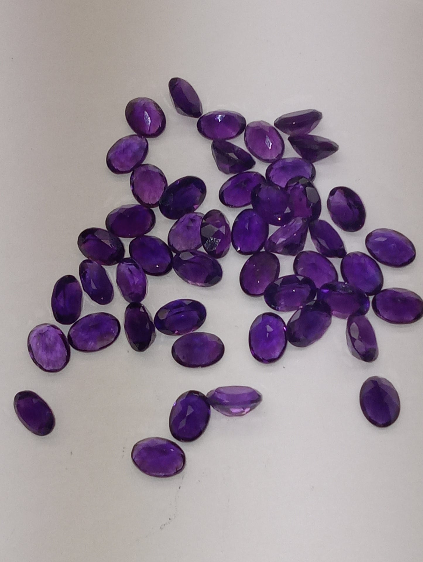 amethyst gemstones dark oval shape, 7mmx5mm, 47 stones