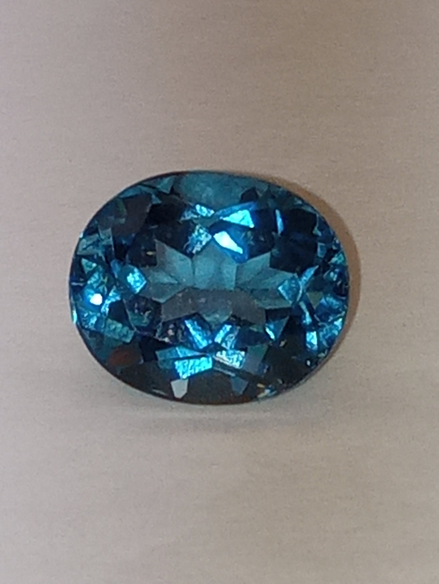 topaz gemstone London blue 12mmx10mm oval cut , Sri Lanka