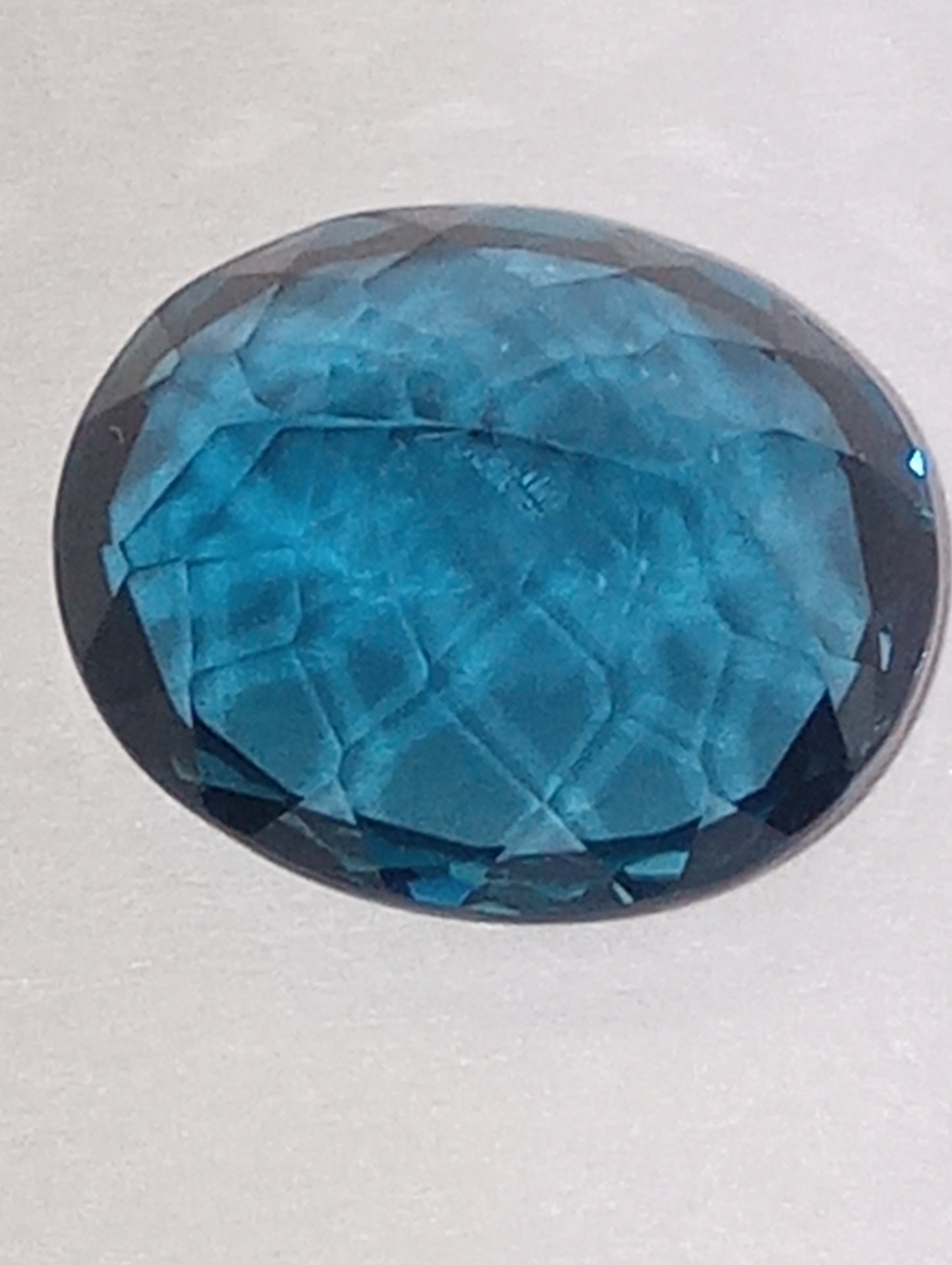 topaz gemstone London blue, 12mmx10mm oval from Sri Lanka