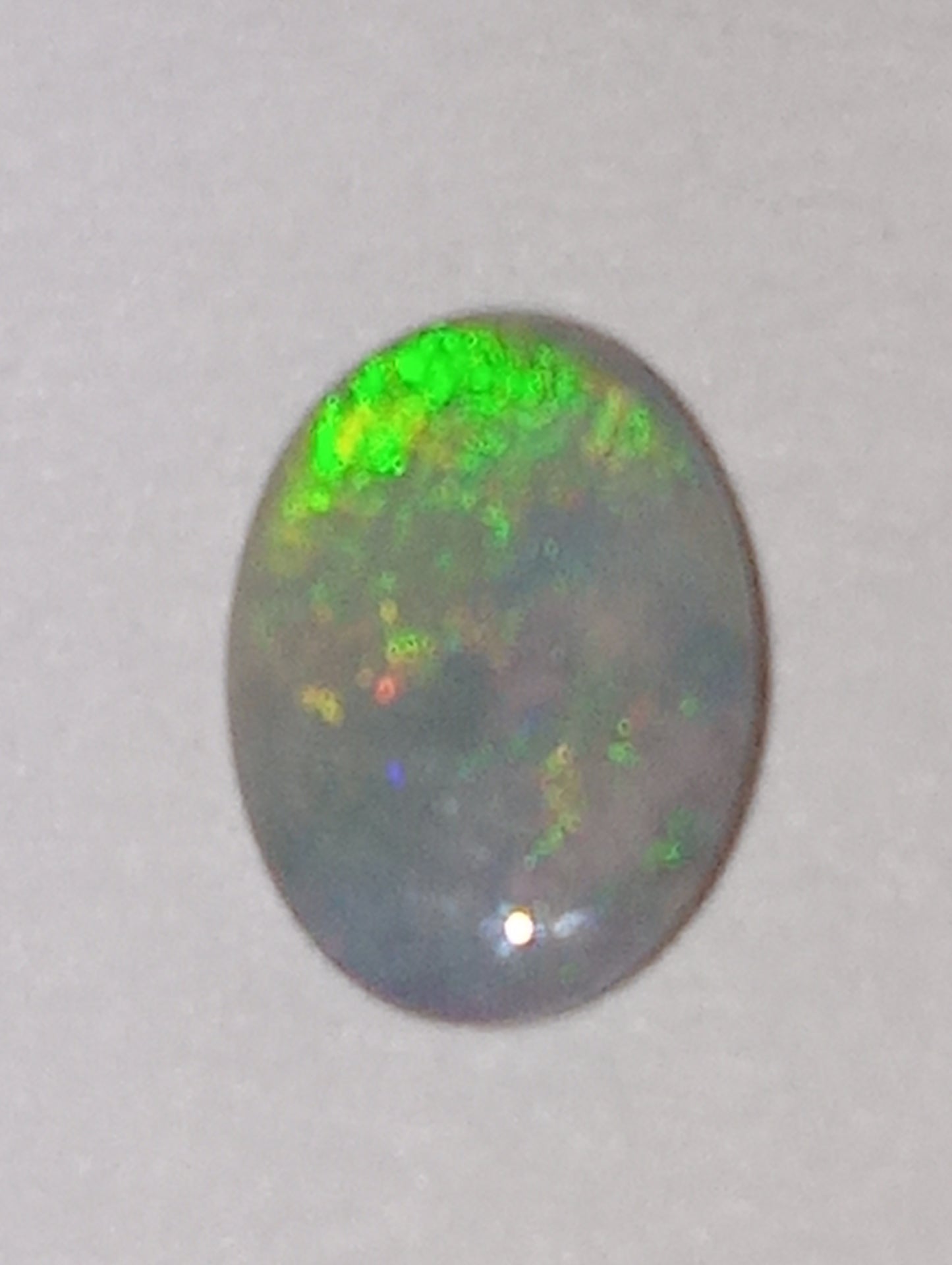 opal gemstone Mintabie gray based, .46ct oval