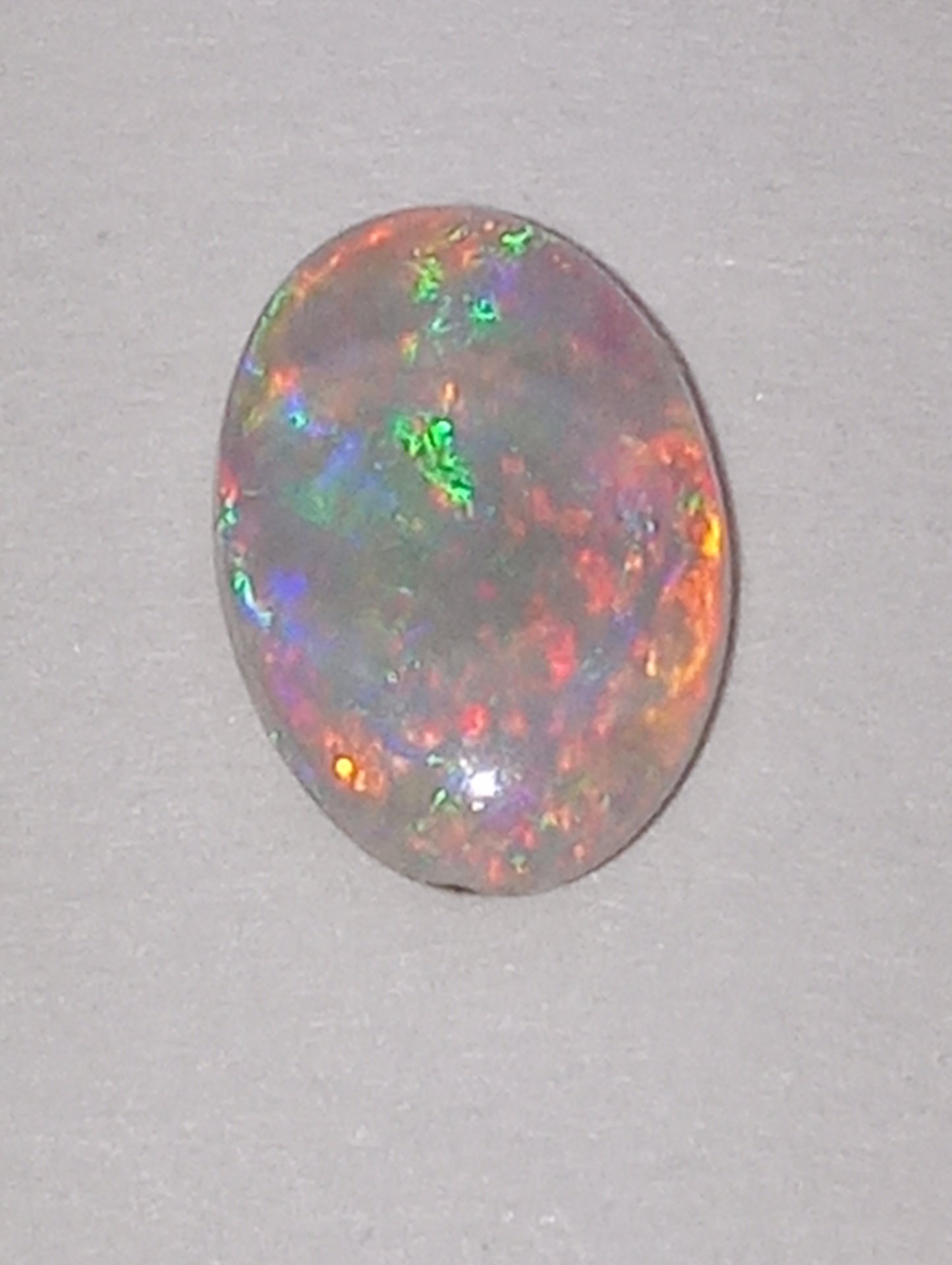 opal gemstone Mintabie gray based oval .56ct