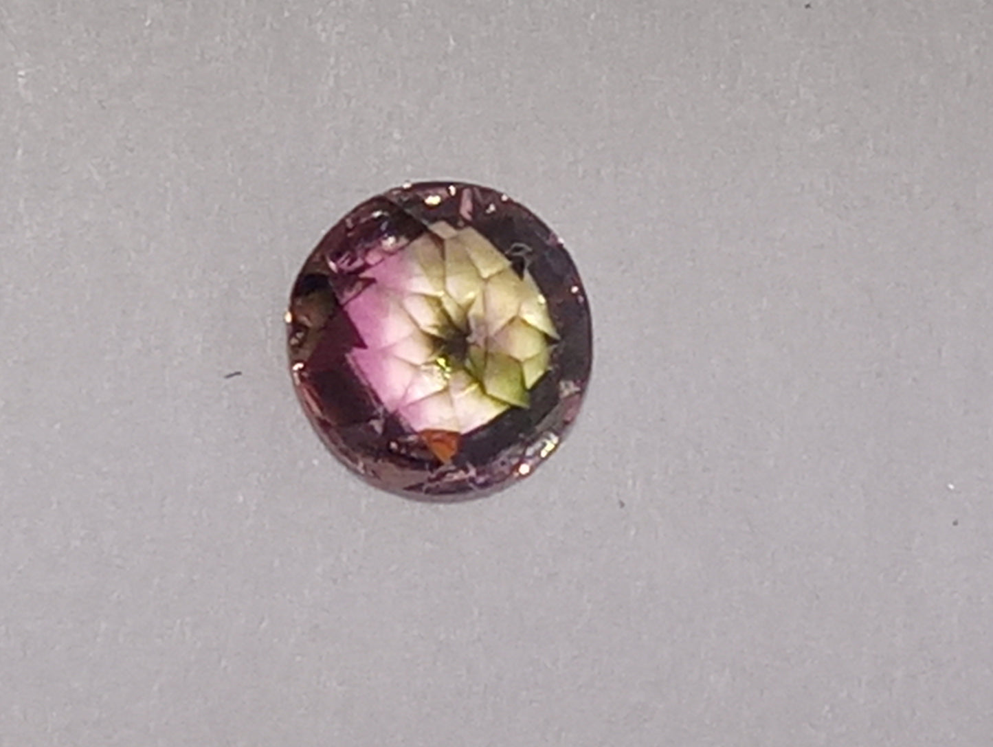 tourmaline gemstone bi-colored , 5mm round cut