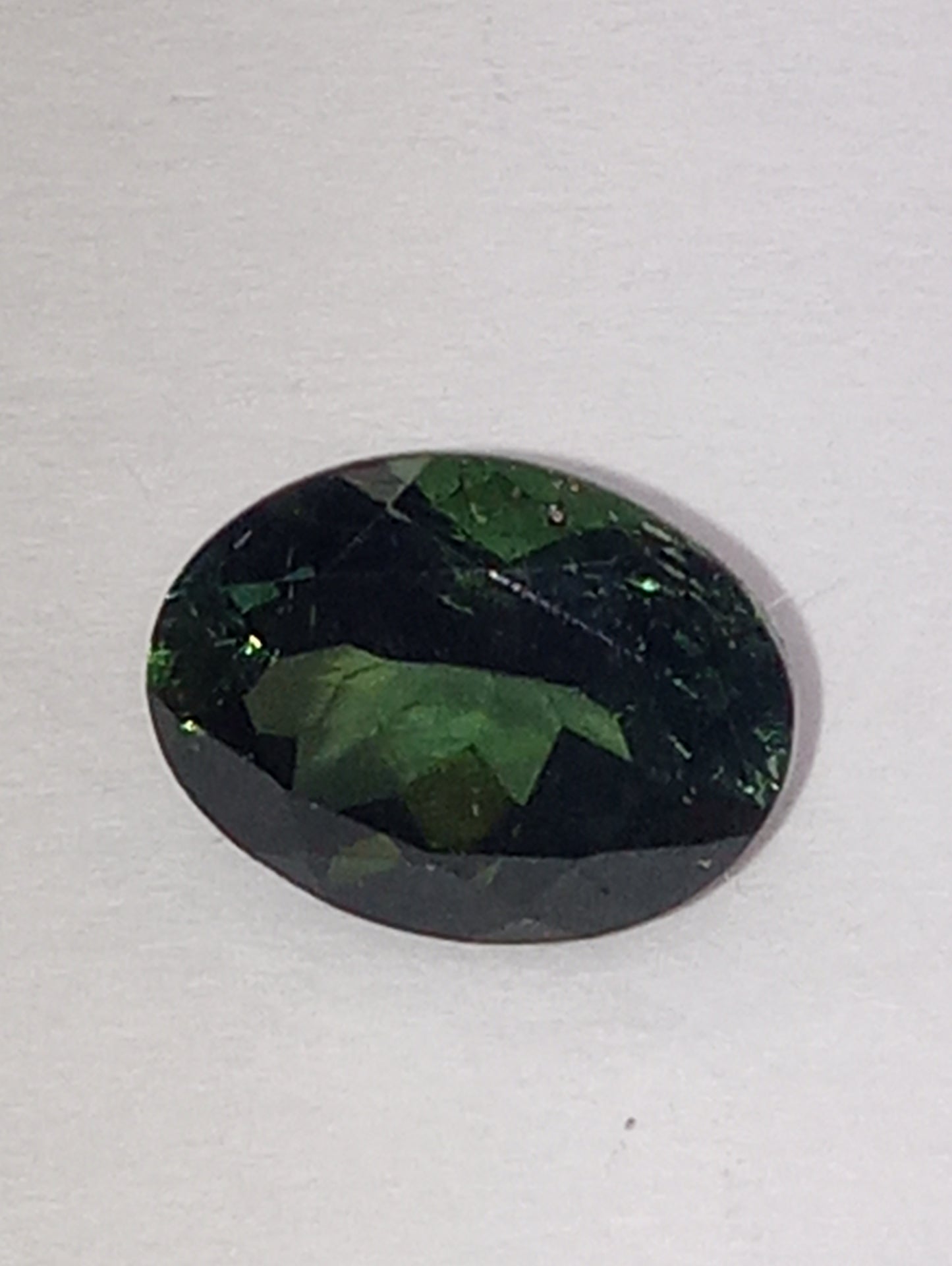 tourmaline gemstone green, 8mmx6mm oval cut, 1.36ct