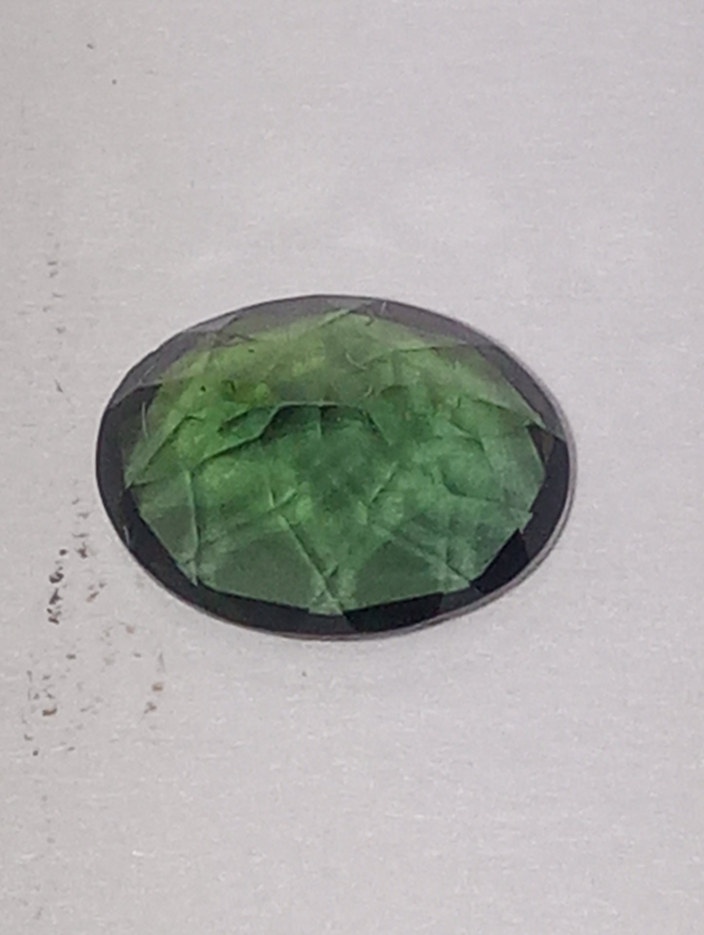 tourmaline gemstone green, 8mmx6mm oval cut, 1.36ct
