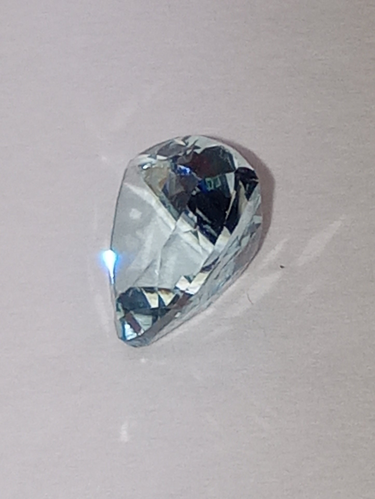 aquamarine gemstone light-med blue, trillion cut, 1.54ct