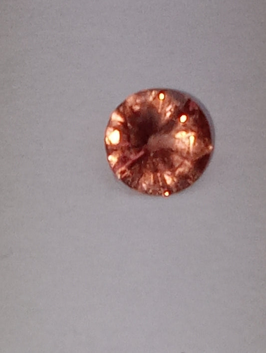 spinel gemstone Burmese, pinky orange, 6mm round cut, .63ct