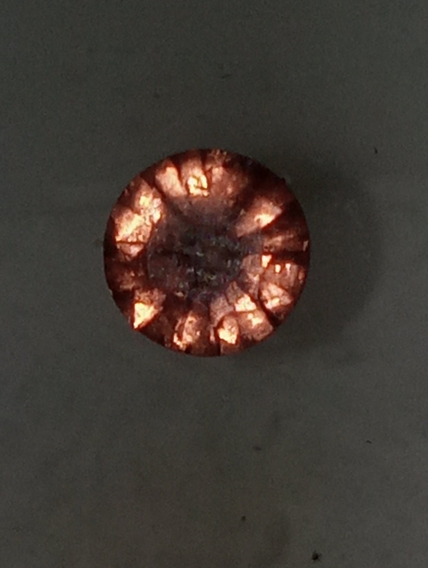 spinel gemstone Burmese, pinky orange, 6mm round cut, .63ct