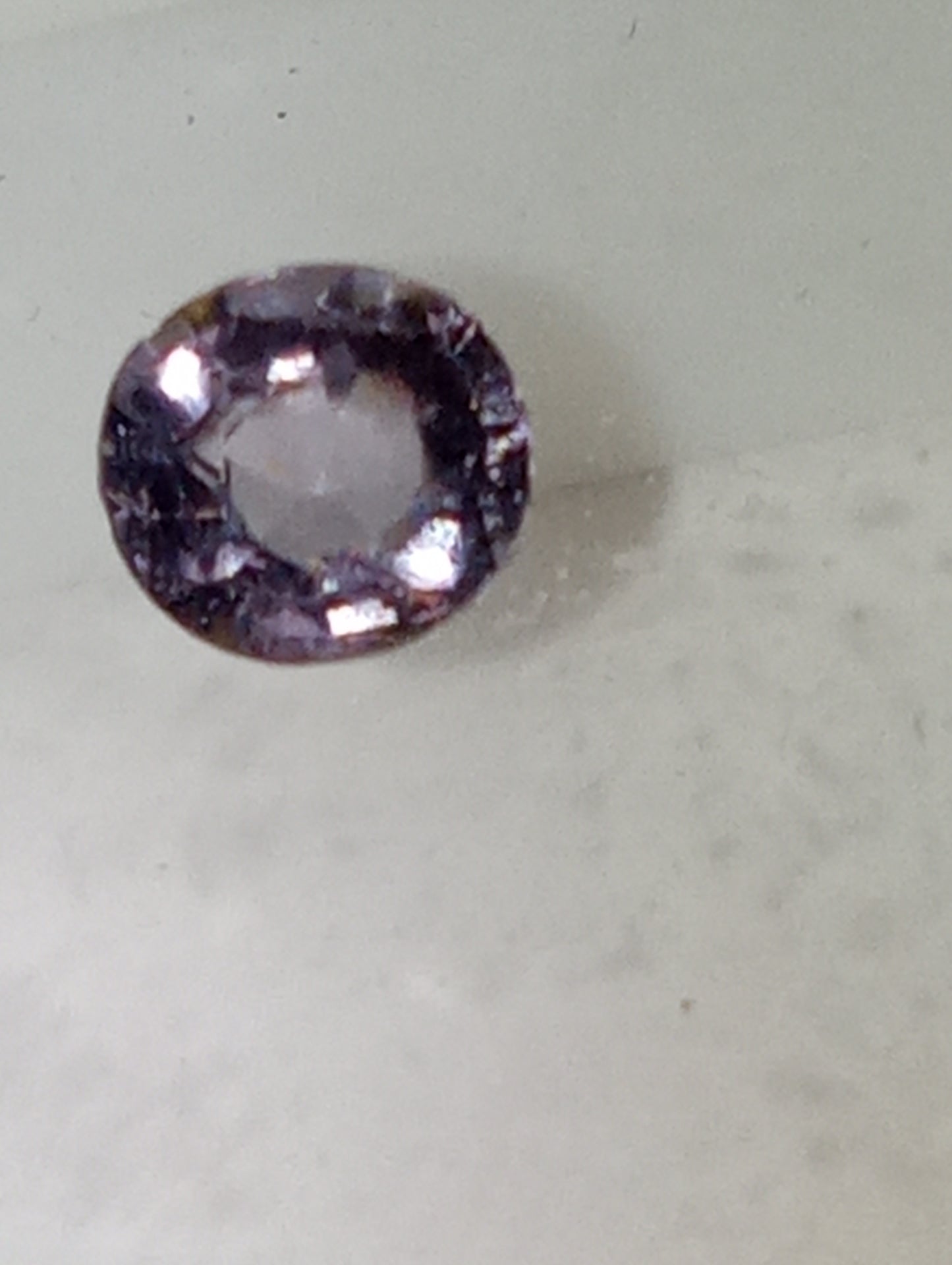 spinel gemstone Burmese, lavender 6mmx5.5mm oval cut, .76ct