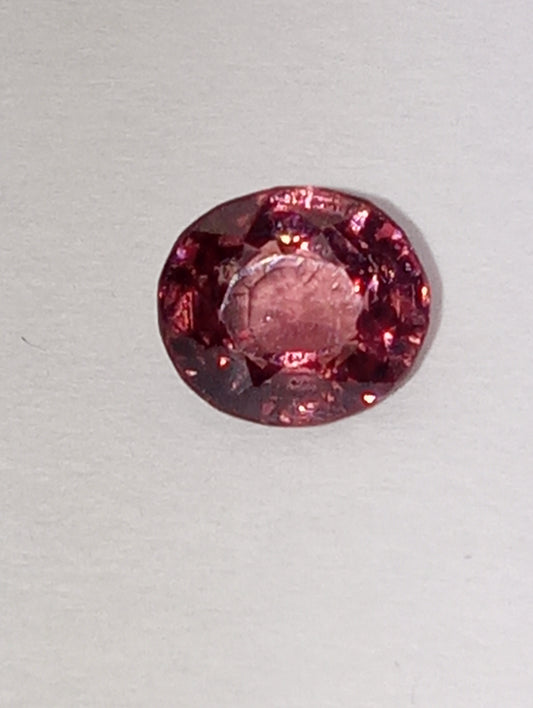 spinel gemstone Burmese, orangey pink, 6mmx5.5mm oval cut .91ct