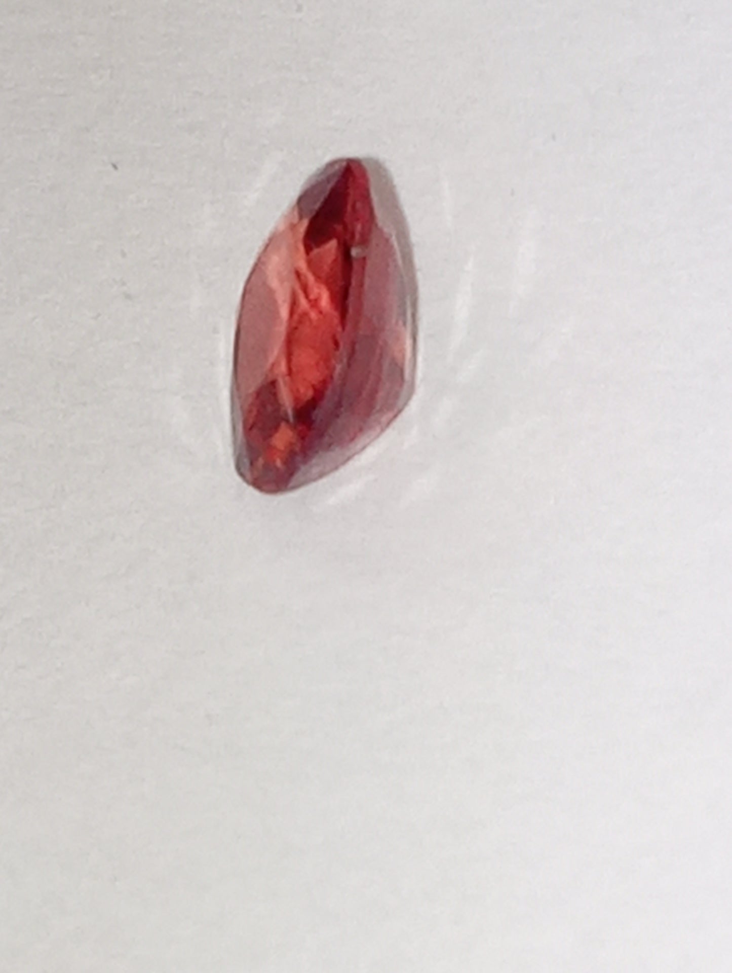 spinel gemstone Burmese, red orange, padparasha color, 6mmx5mm oval cut, .62ct