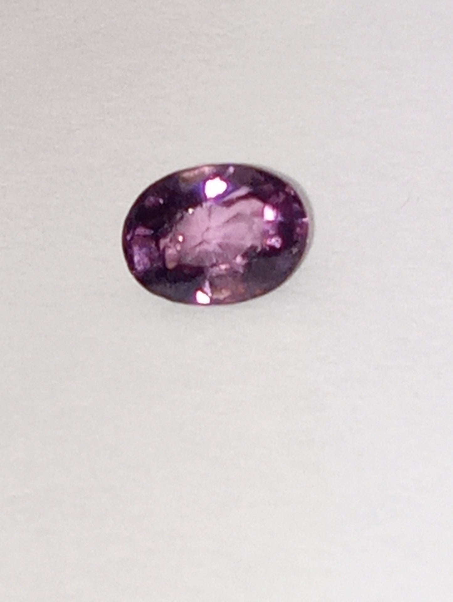 spinel gemstone Burmese, pinky purple, 5mmx4mm oval cut, .62ct