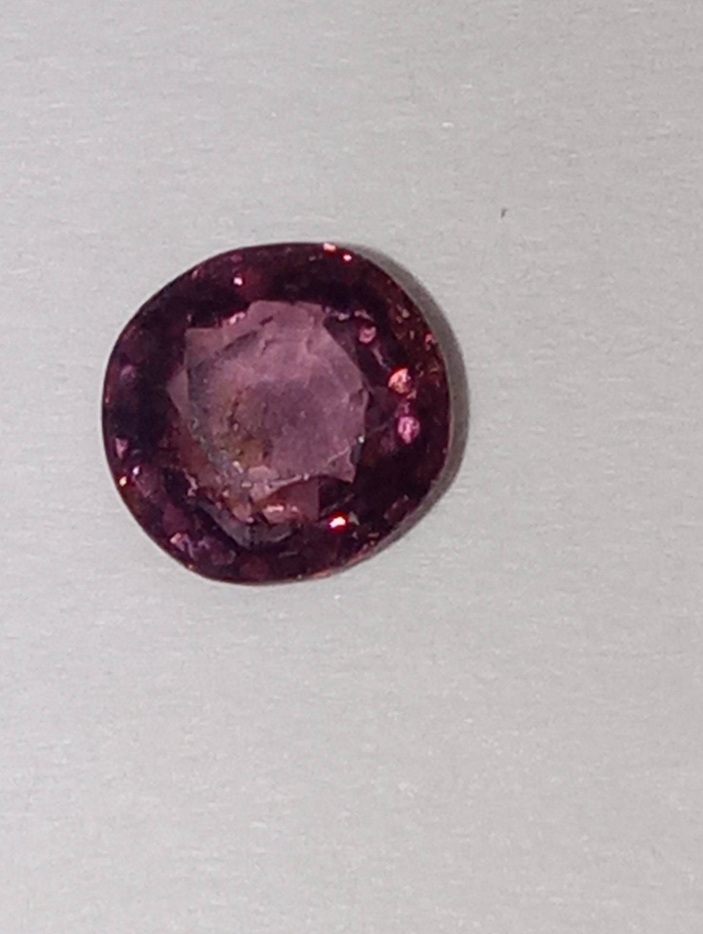 spinel gemstone Burmese, pinky purple. 5mm round cut, .51ct