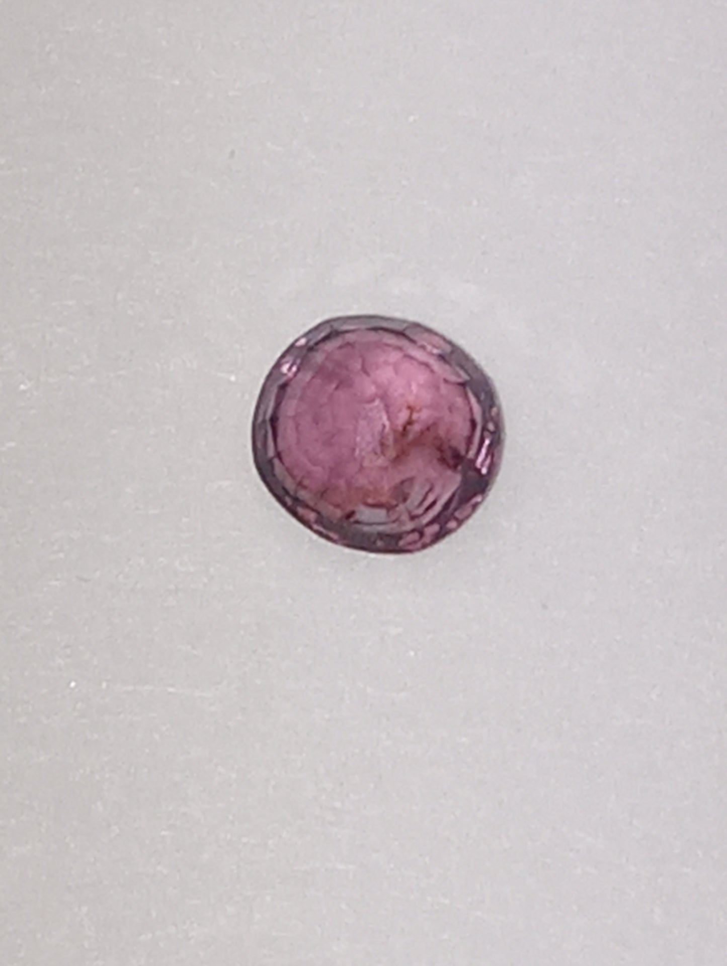 spinel gemstone Burmese, pinky purple. 5mm round cut, .51ct
