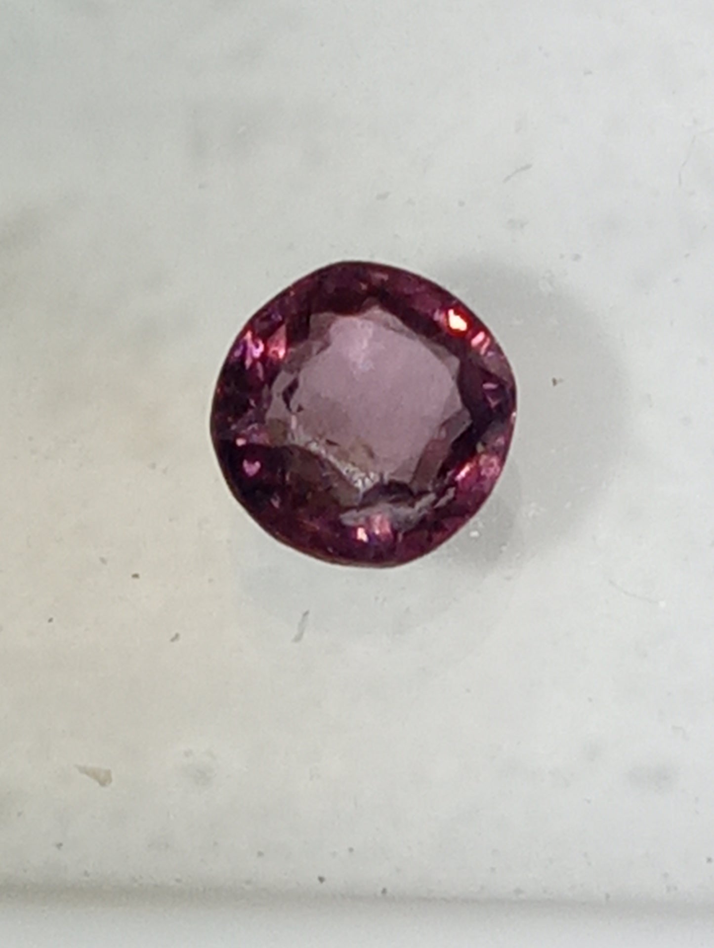 spinel gemstone Burmese, pinky purple. 5mm round cut, .51ct