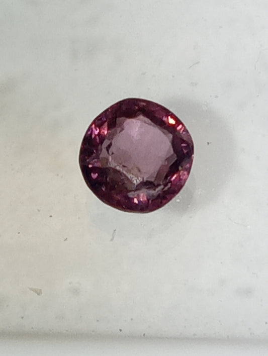 spinel gemstone Burmese, pinky purple. 5mm round cut, .51ct