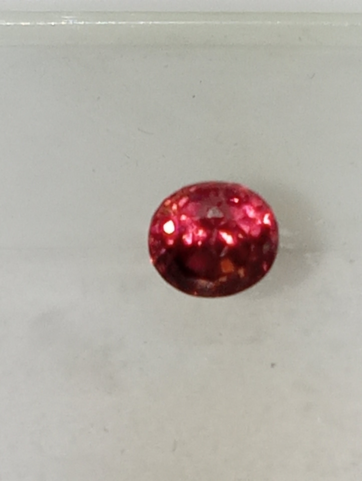 spinel gemstone Burmese, dark pink, 5.5mm round cut, .80ct  deep cut