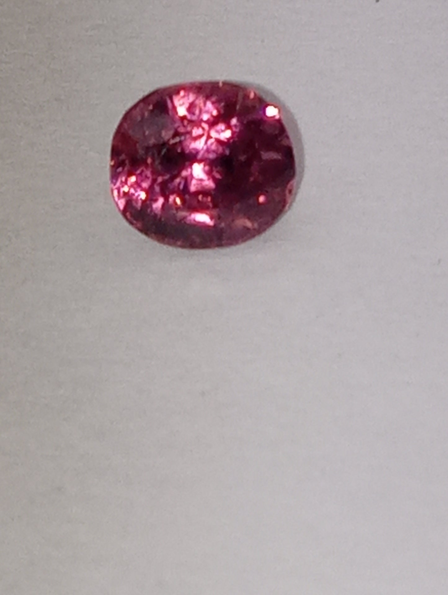 spinel gemstone Burmese, dark pink, 5.25mmx5mm oval cut, .72ct