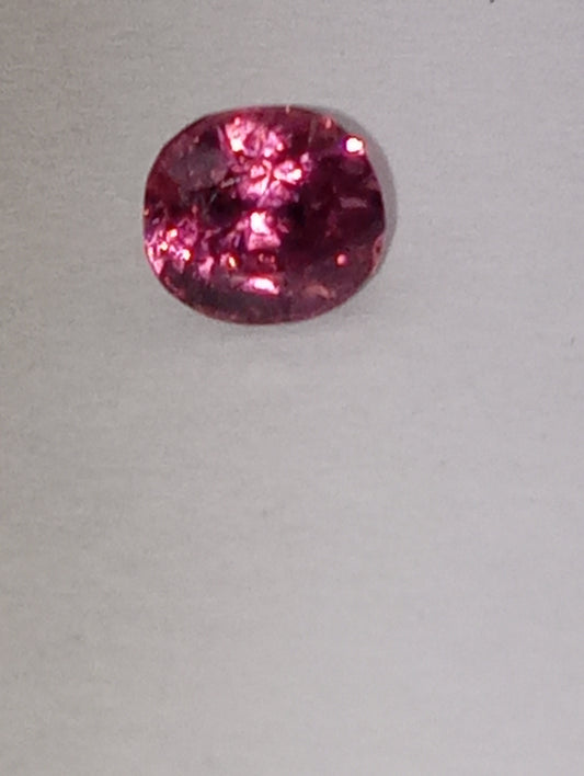 spinel gemstone Burmese, dark pink, 5.25mmx5mm oval cut, .72ct