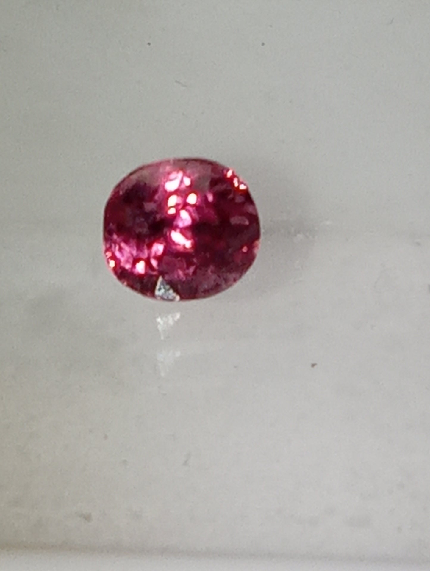 spinel gemstone Burmese, dark pink, 5.25mmx5mm oval cut, .72ct