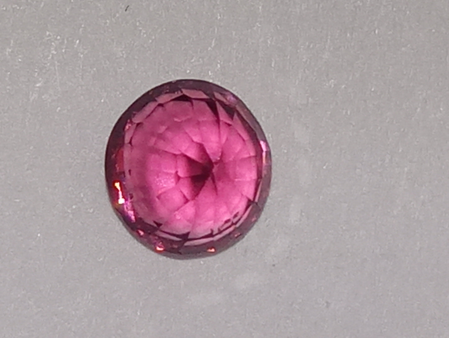 spinel gemstone Burmese, dark pink, 5.25mmx5mm oval cut, .76ct