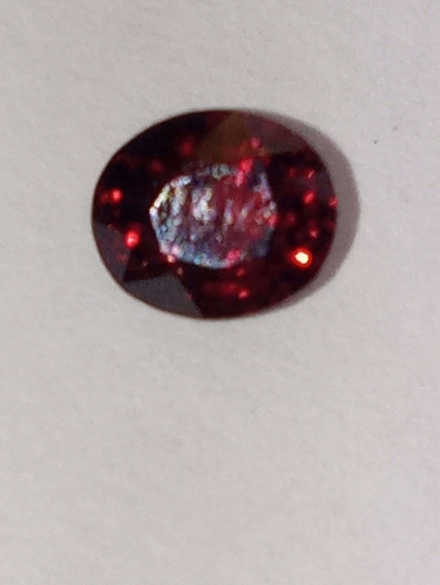 spinel gemstone Burmese, red, 5mmx4mm oval cut, .54ct
