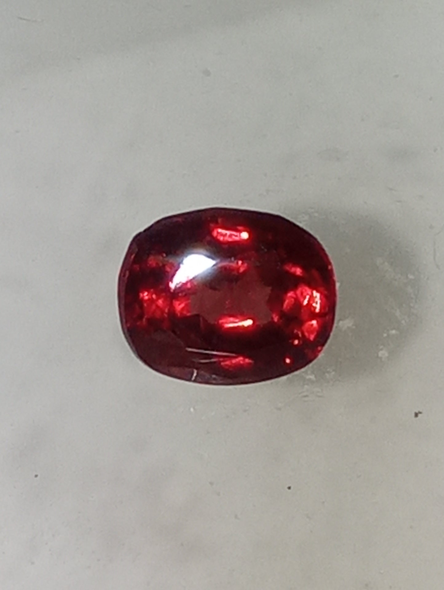 spinel gemstone Burmese, red, vivid, 5mmx4mm oval cut, .51ct