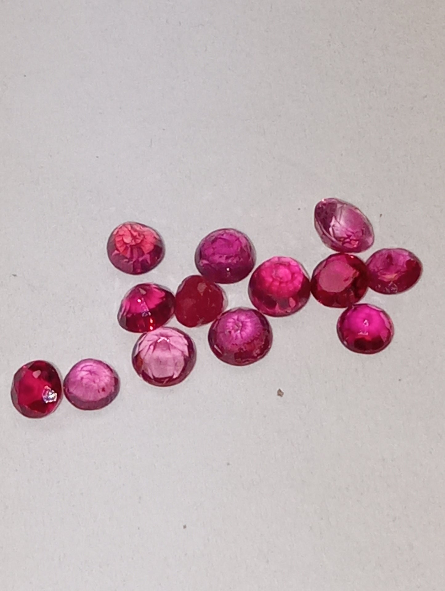 ruby gemstones 2.5mm-3.25mm rounds, 13 stones, 1.44ctw