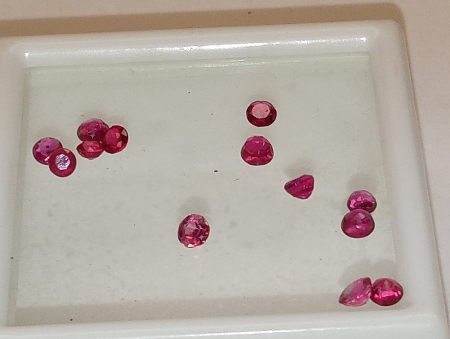 ruby gemstones 2.5mm-3.25mm rounds, 13 stones, 1.44ctw