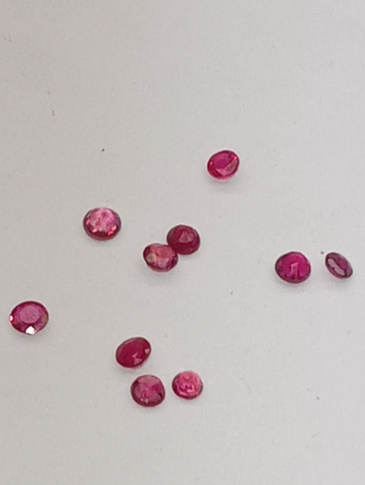 ruby gemstones 2.5mm-3mm round cuts, 10 stones, .99ctw