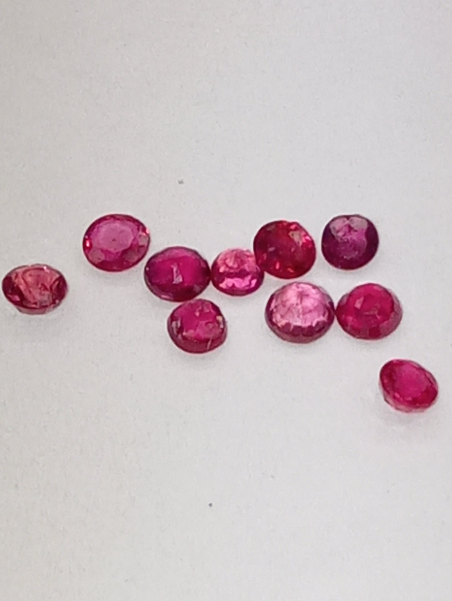 ruby gemstones 2.5mm-3mm round cuts, 10 stones, .99ctw