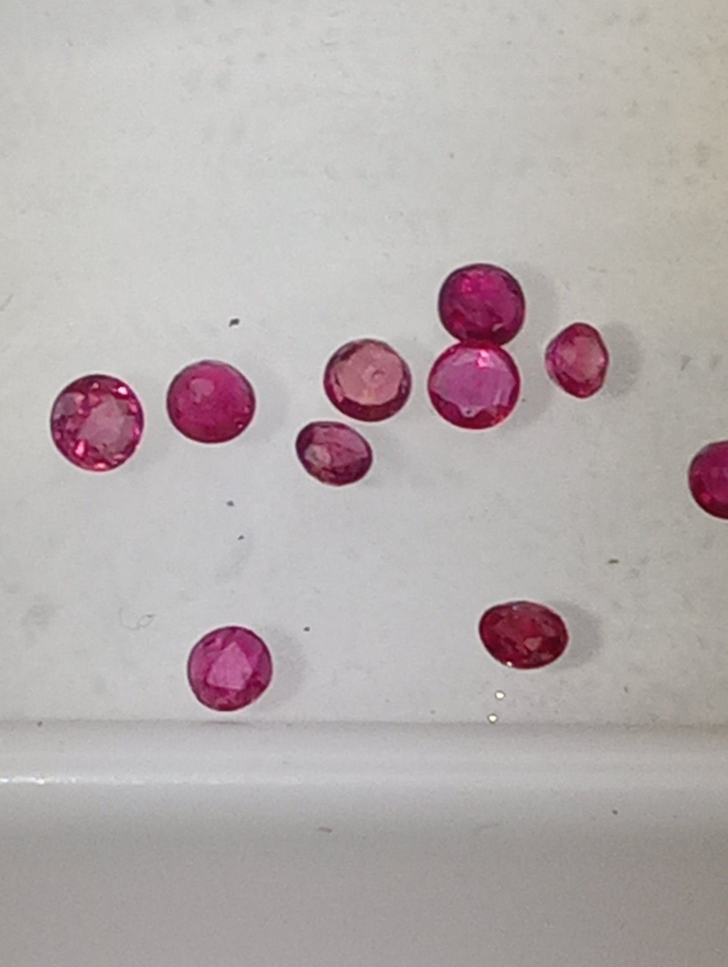 ruby gemstones 2.5mm-3mm round cuts, 10 stones, .99ctw