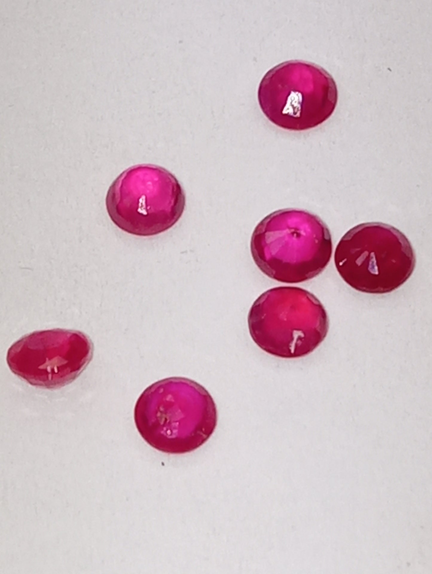 ruby gemstones Burma 3mm round cuts, 7 stones .93ctw