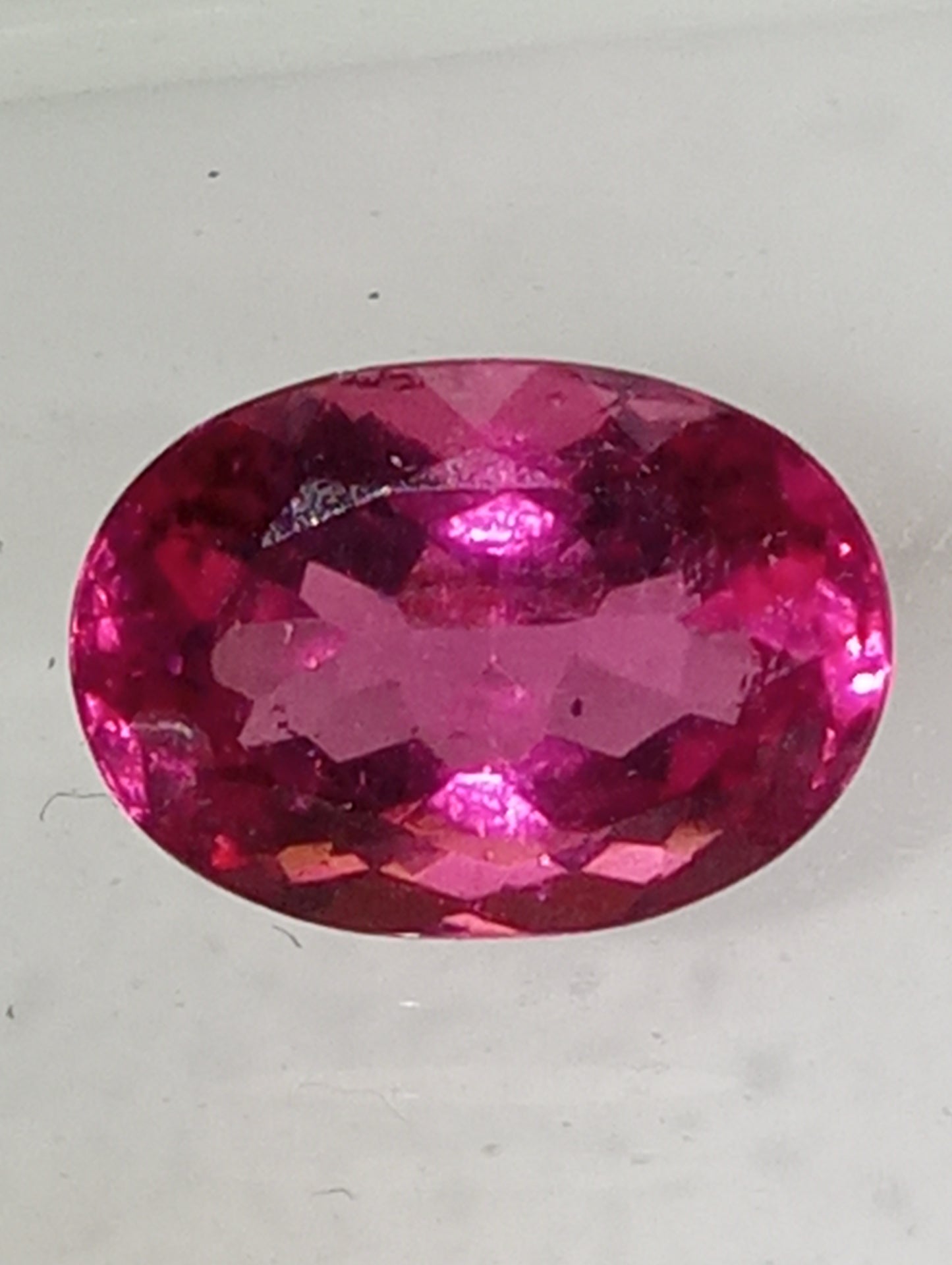 tourmaline gemstone neon hot pink, 11mmx8mm oval cut, 3.22ct
