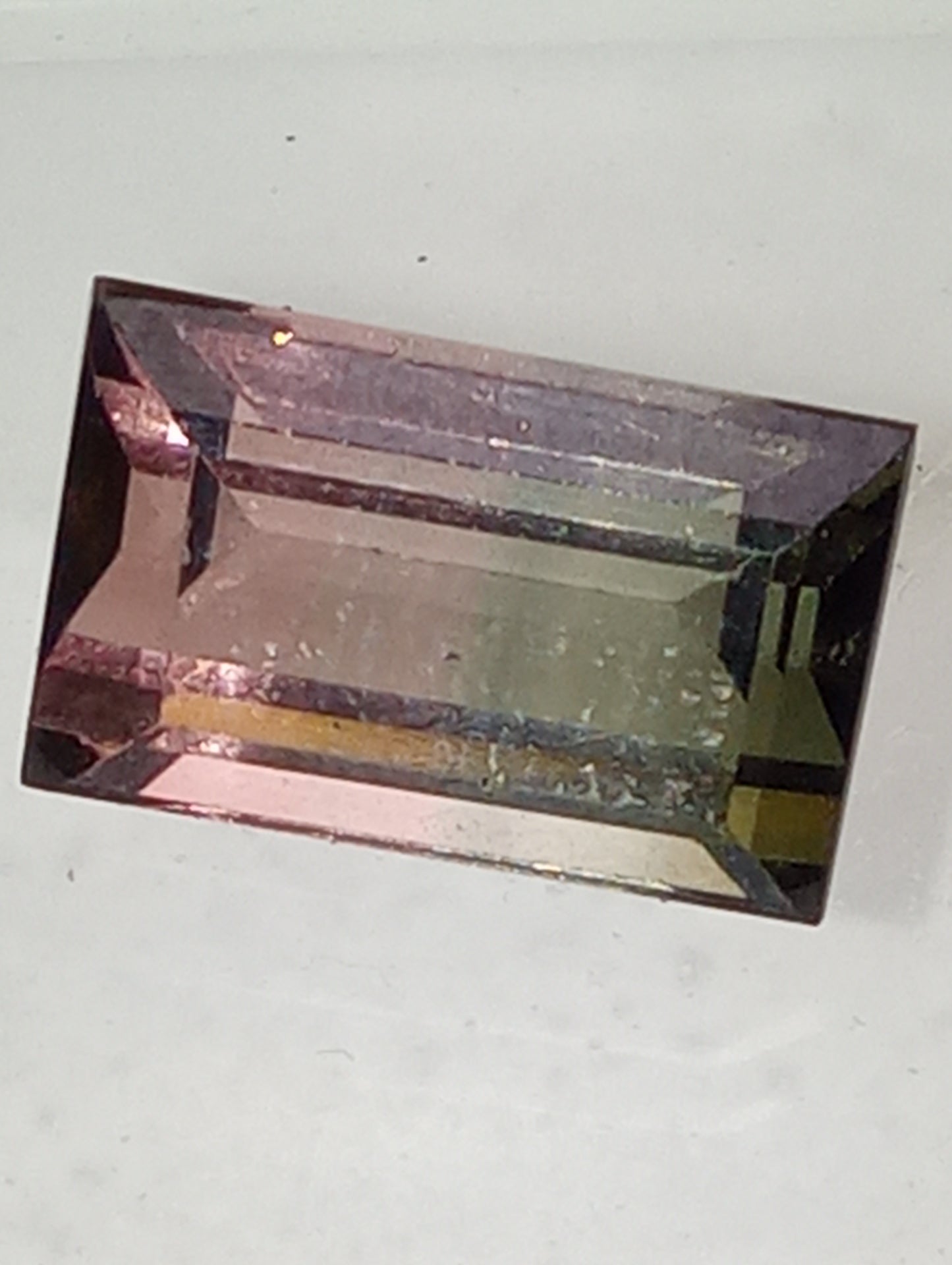 tourmaline gemstone bi-colored, 12.75mmx8mm emerald cut, 6.93ct