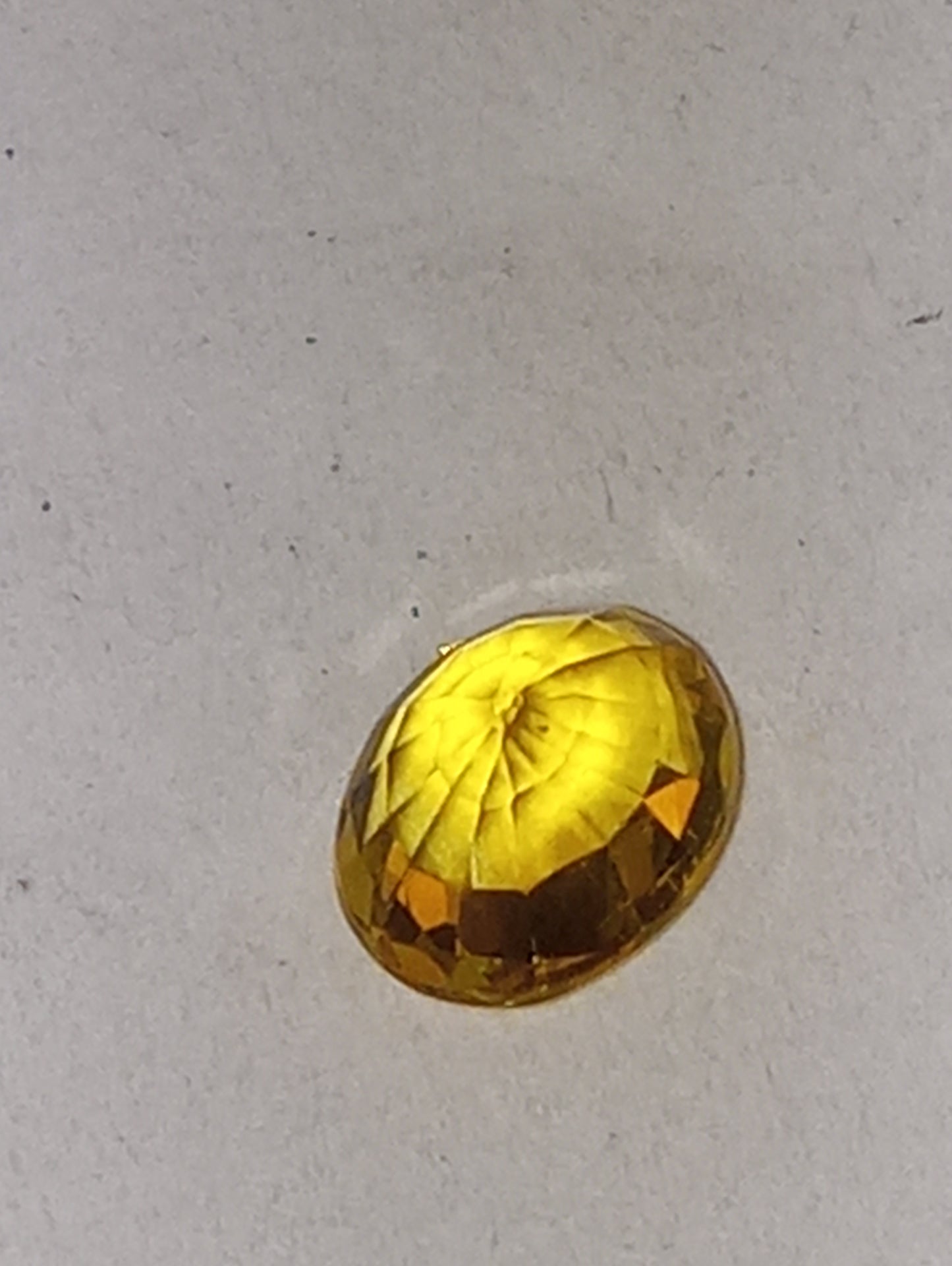 sapphire gemstone yellow vivid, 4.5mmx5.75mm oval cut, .66ct
