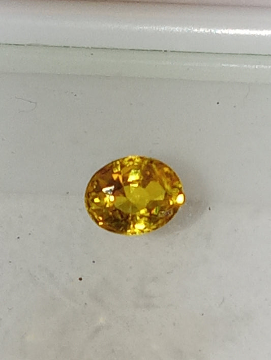 sapphire gemstone yellow vivid, 4.5mmx5.75mm oval cut, .66ct