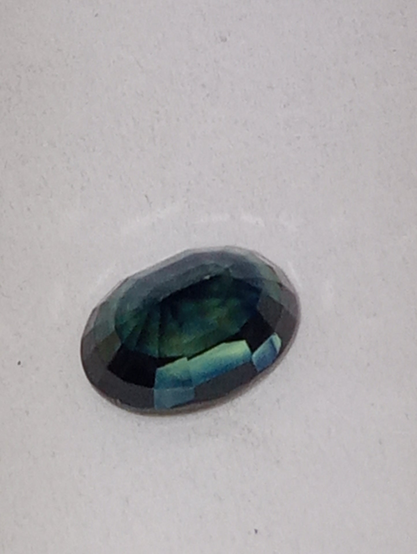 sapphire gemstone Kanchanteberry green blue, 7mmx5mm oval cut, 1.40ct