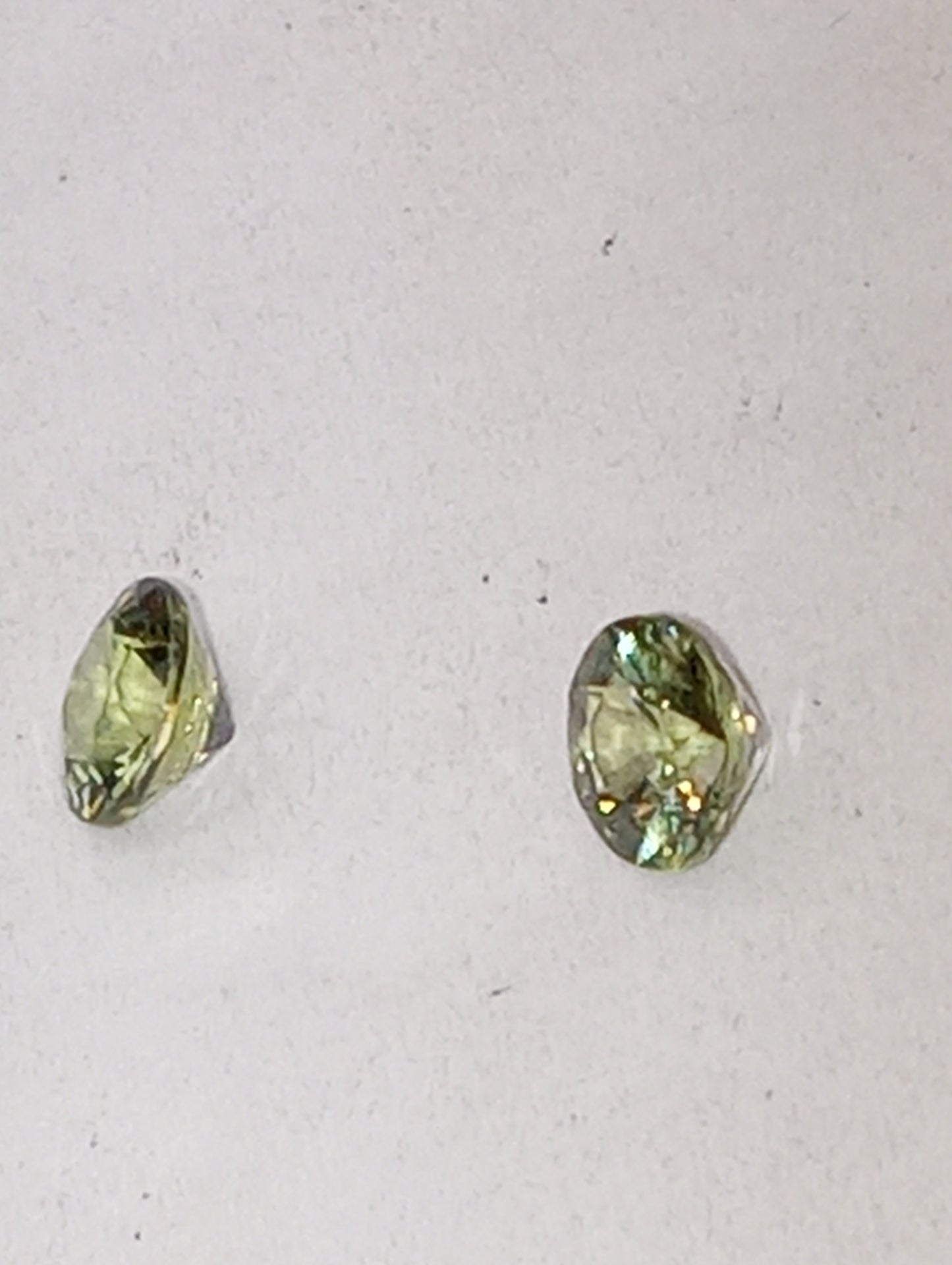 sapphire green 4.5mm round cuts, 2 stones .90ctw