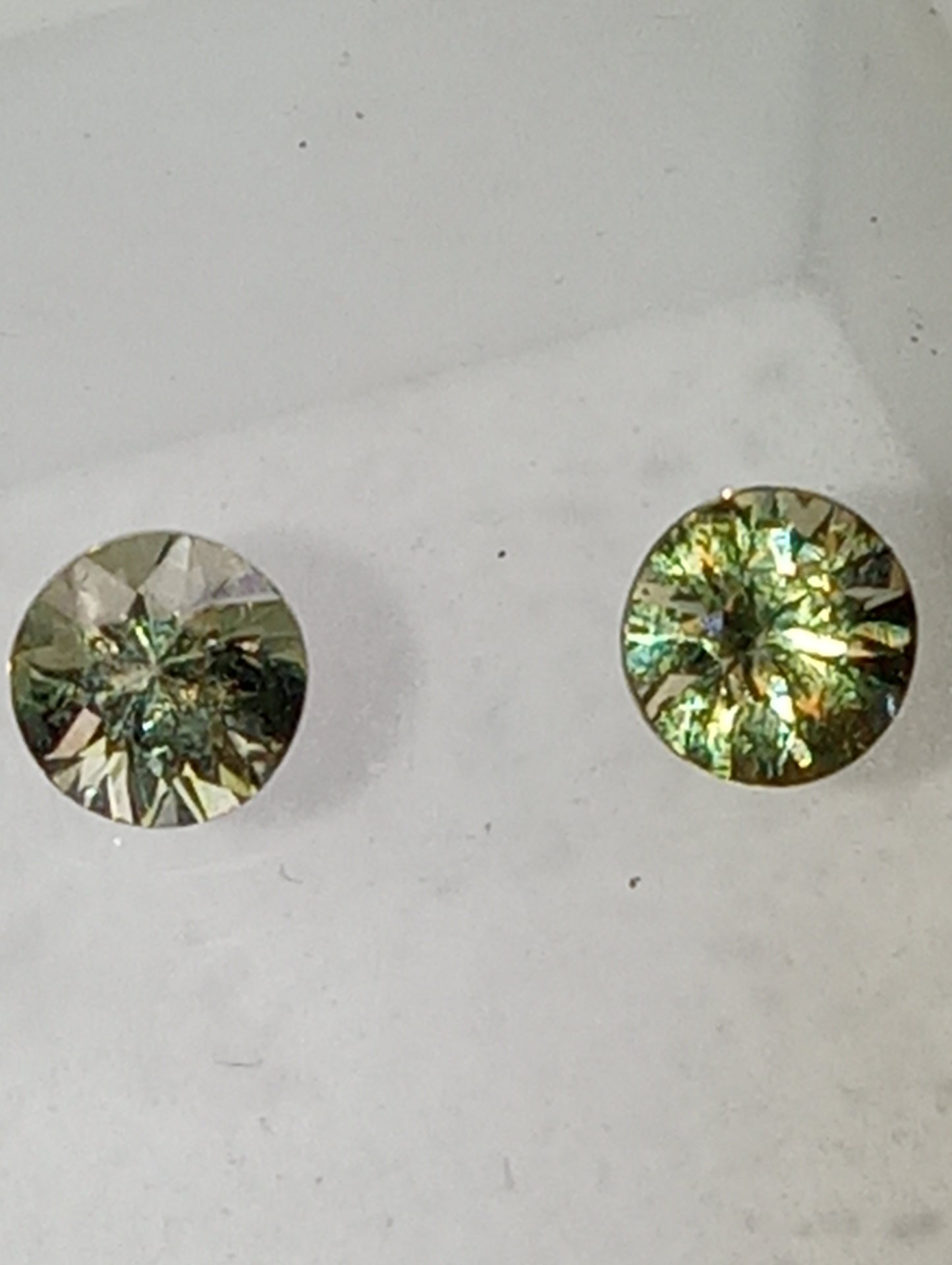 sapphire green 4.5mm round cuts, 2 stones .90ctw