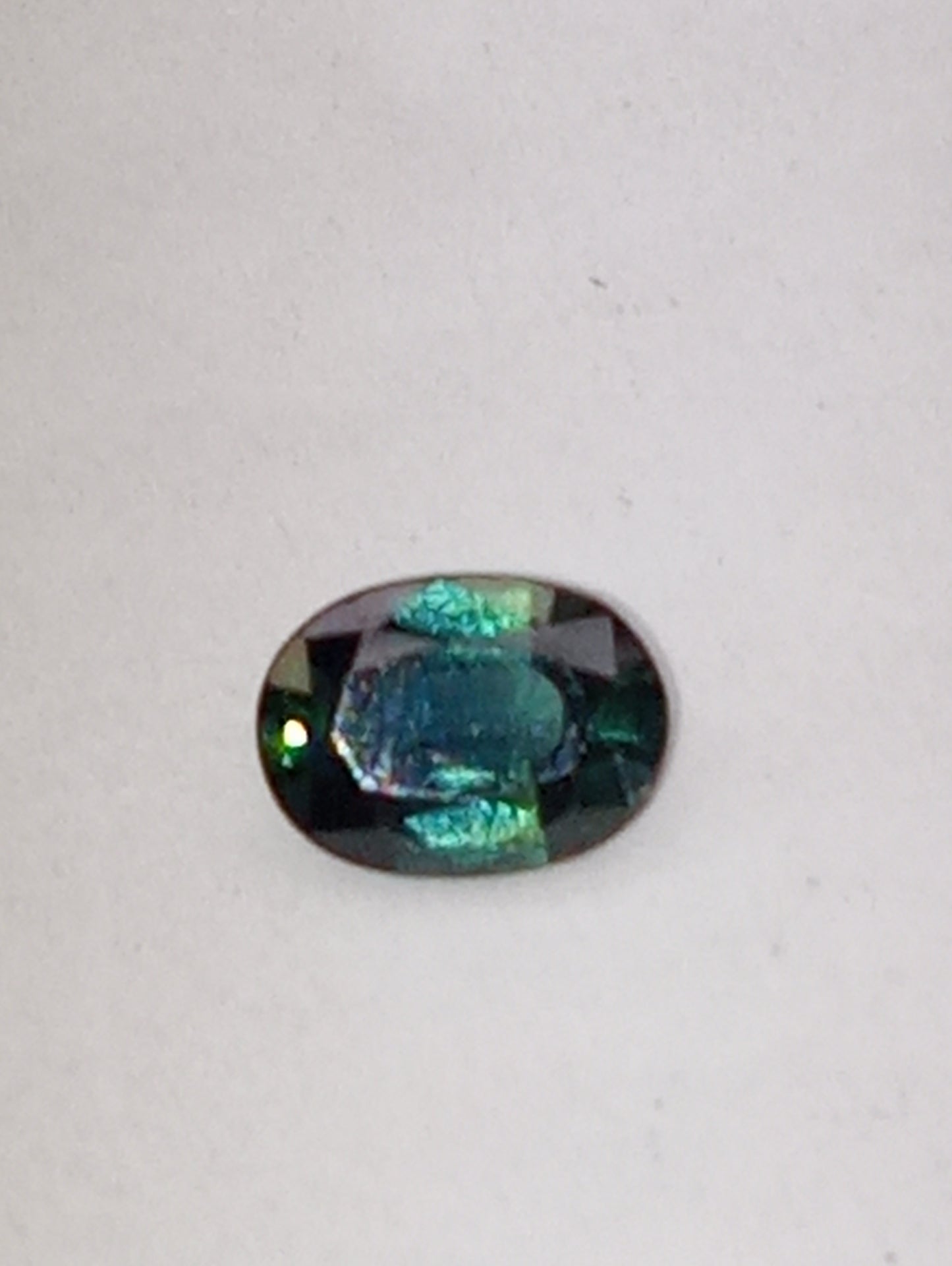 sapphire gemstone teal, 7mmx5mm oval cut,.96ct