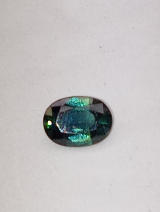 sapphire gemstone teal, 7mmx5mm oval cut,.96ct
