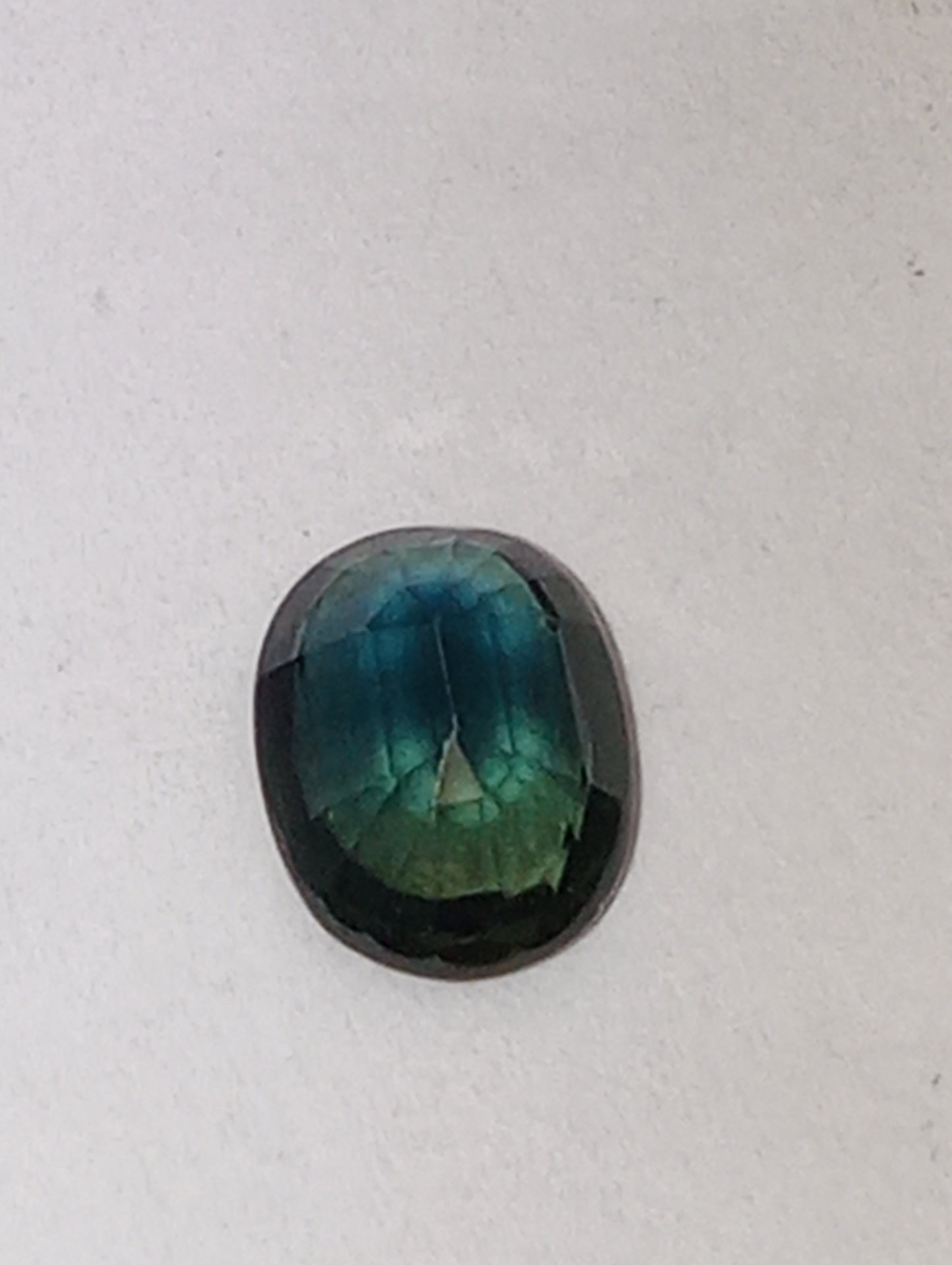 sapphire gemstone teal, 7mmx5mm oval cut,.96ct