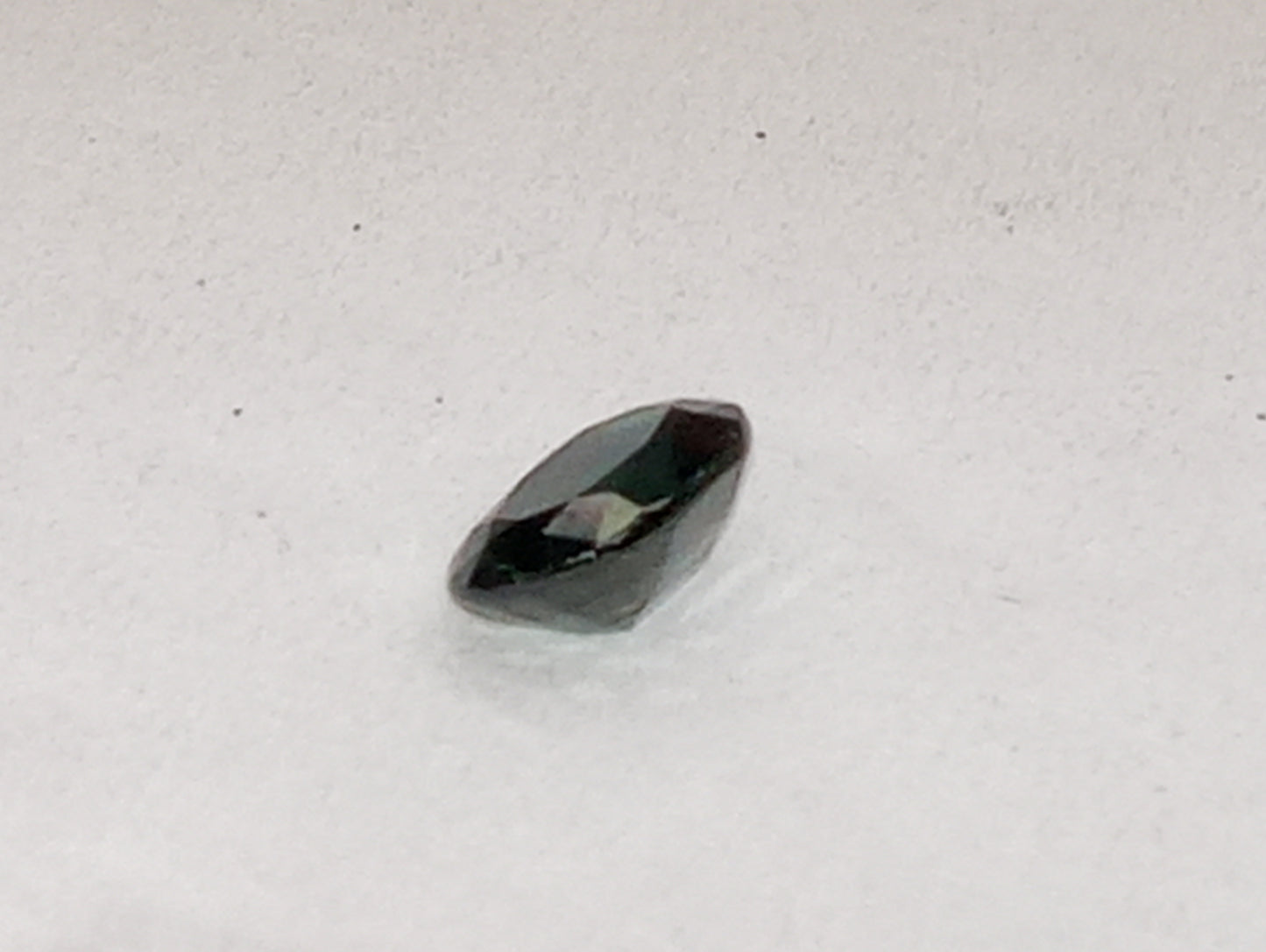 sapphire gemstone teal, 7mmx5mm oval cut,.96ct