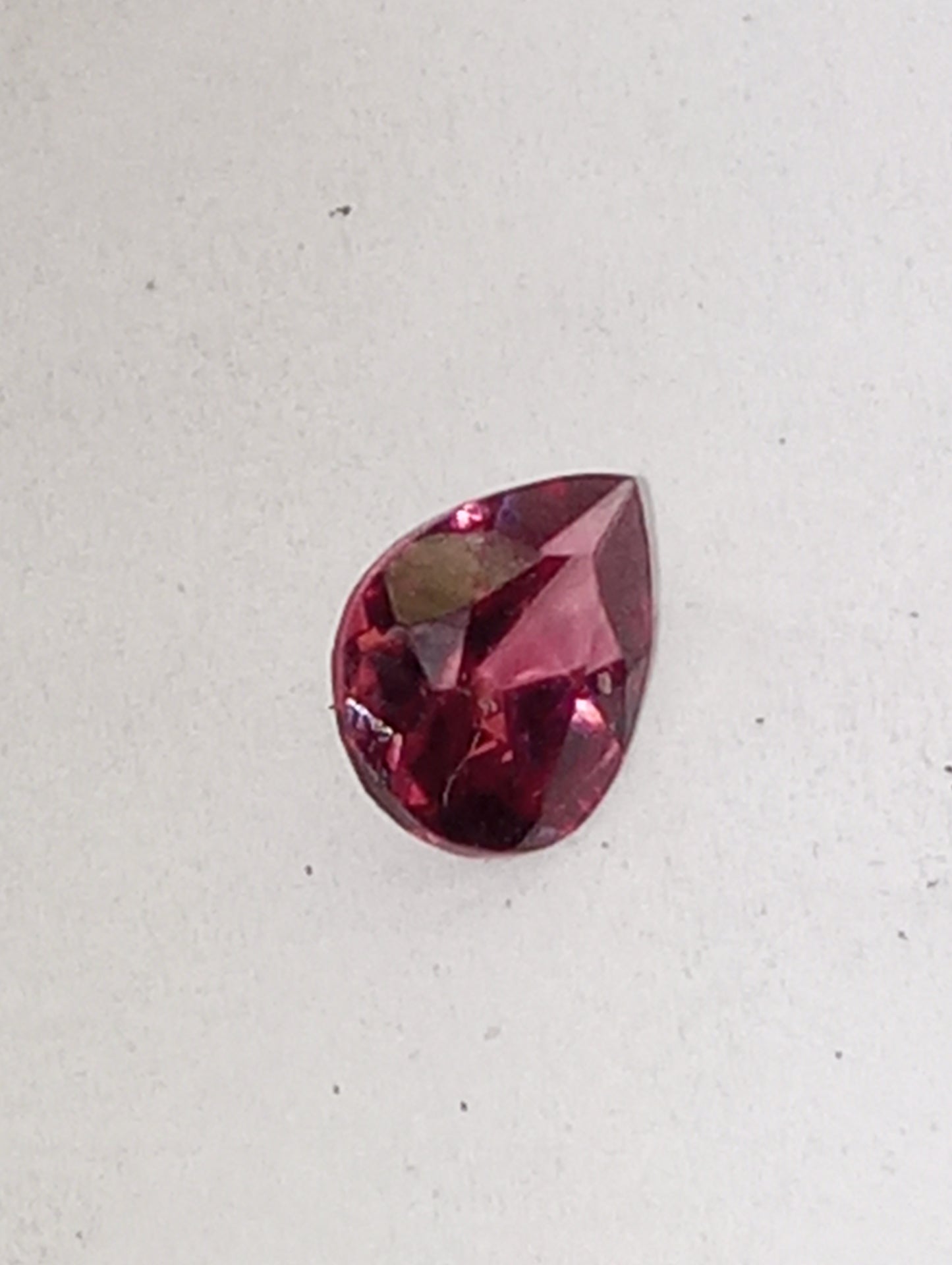 garnet gemstone rhodolite, 7mmx5mm pear cut, .81ct
