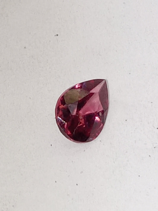 garnet gemstone rhodolite, 7mmx5mm pear cut, .81ct