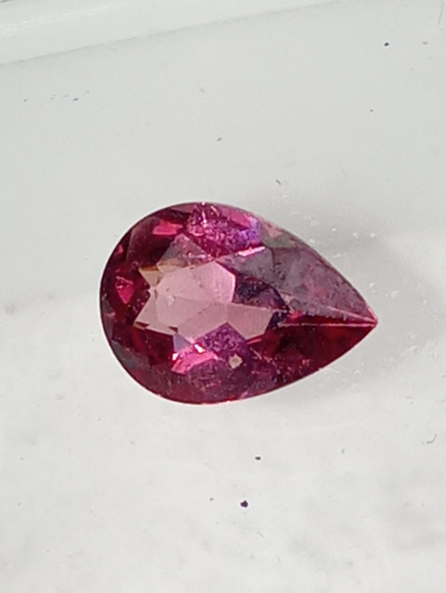garnet gemstone rhodolite, 7mmx5mm pear cut, .81ct
